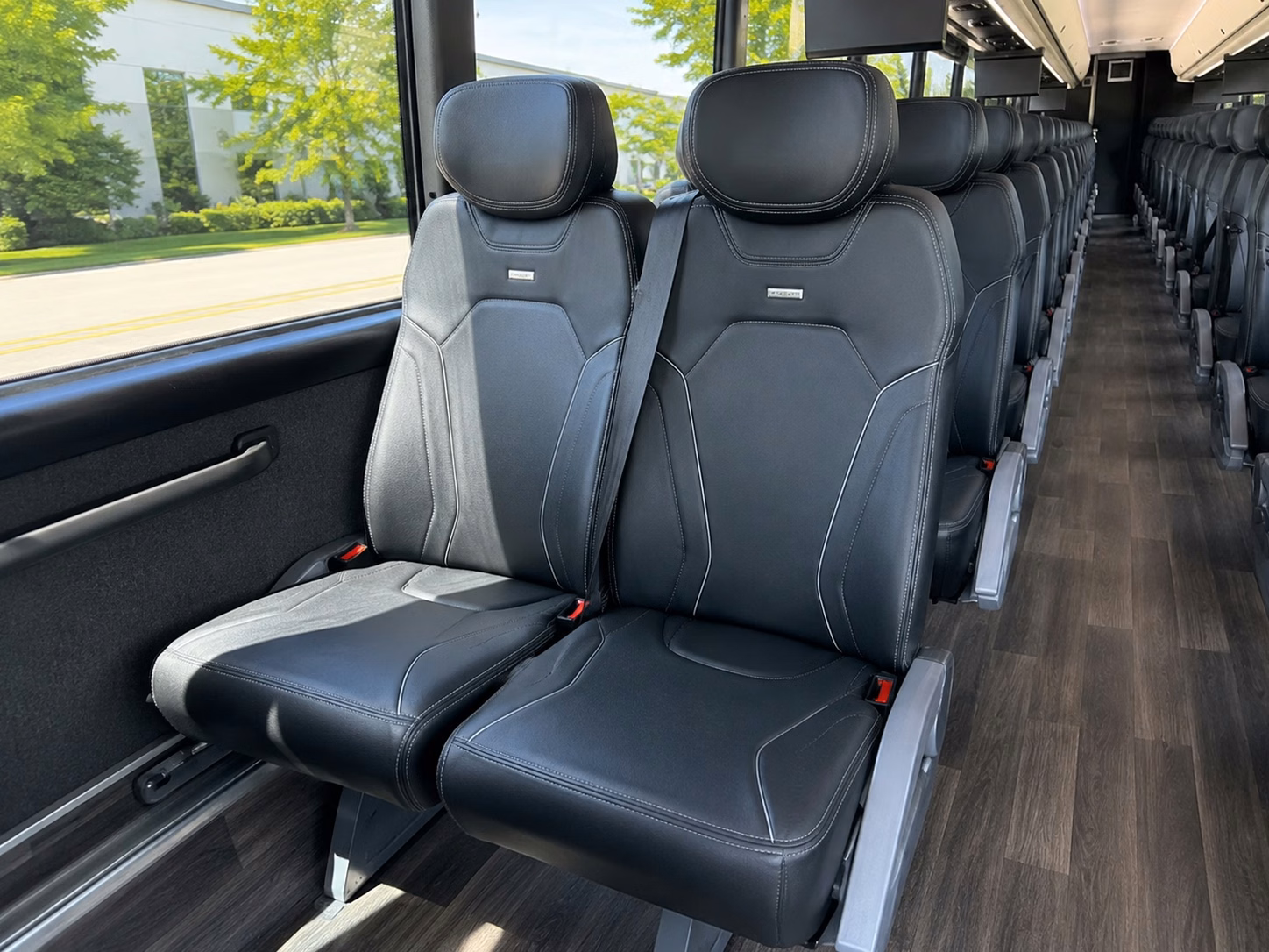 call to book long distance sporting event transportation from lowell
